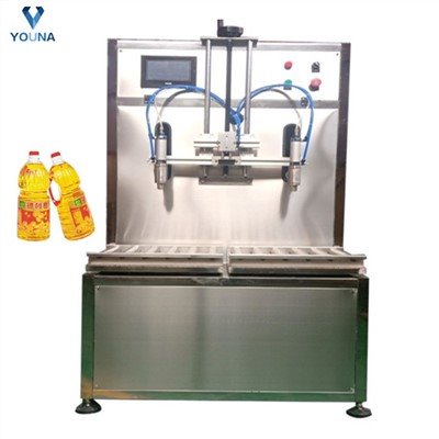 Semi Automatic 4 Head 25L Liquid Paste Filling Packing Machine Line in Drum Bucket Bottle for Packaging Sauce, Juice, Ketchup, Milk, Palm Oil, Paint